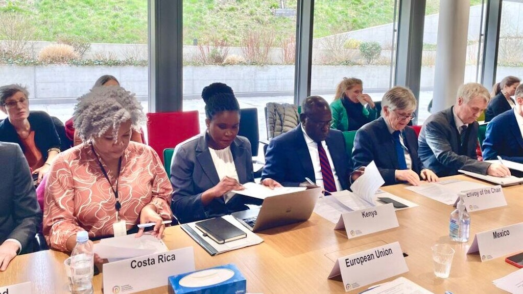 Representatives sitting at a table